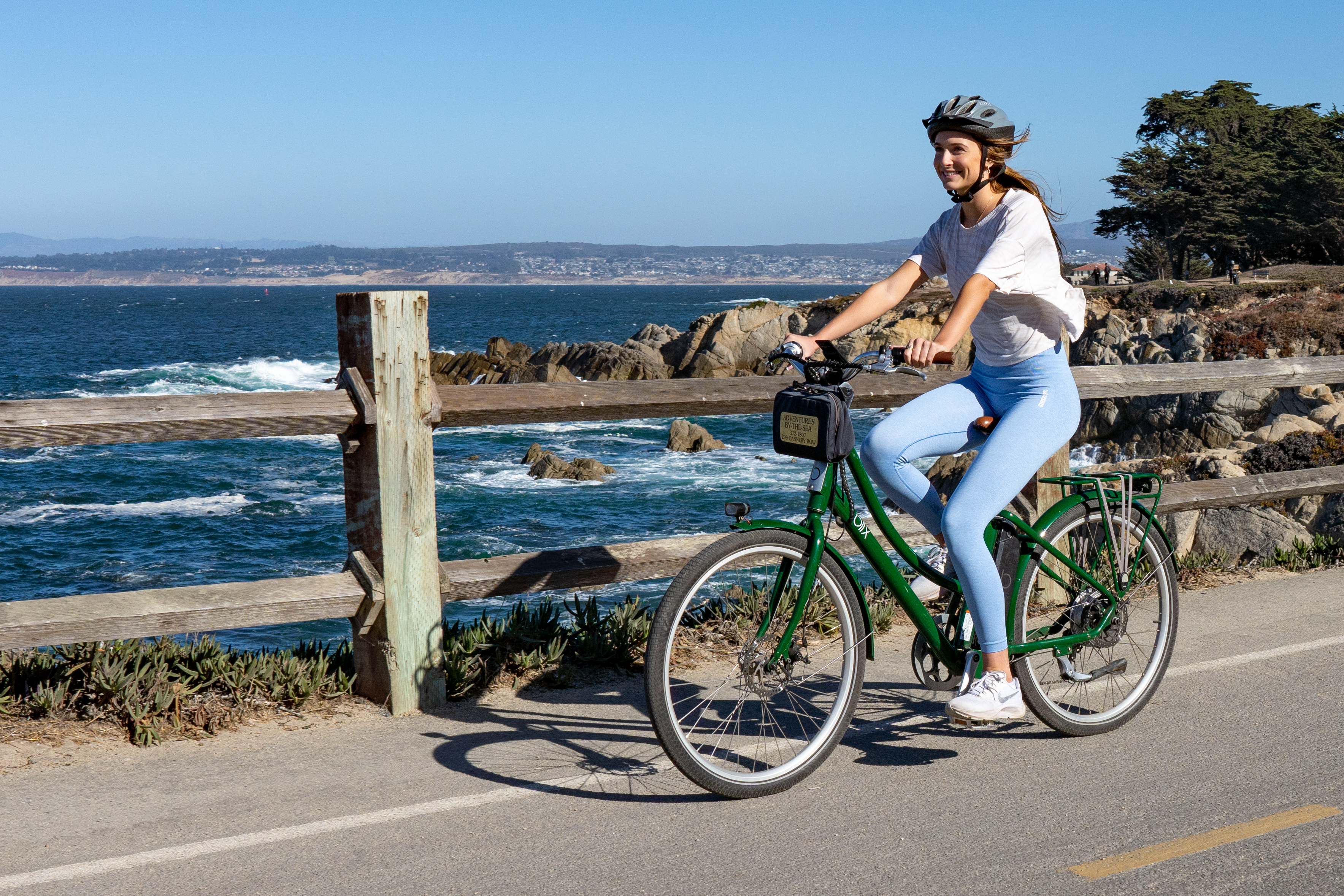 Rider on an Adventures By The Sea e-bike along the Monterey coastal trail